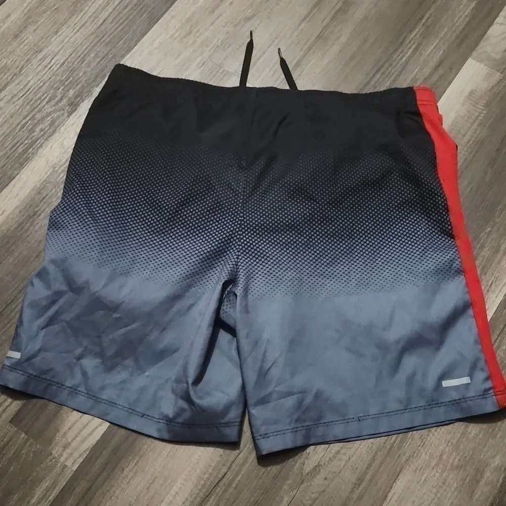 FILA  Swimtrunks Size Small Black and Red color EUC